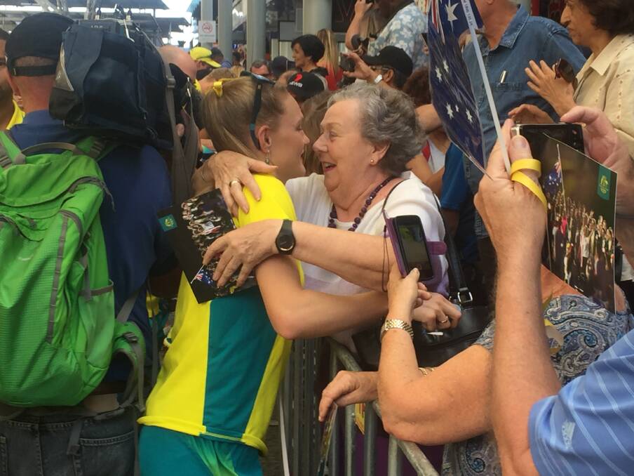 Marge Breitenbach says thanks to grand daughter Caitlin Sergeant-Jones, one of Australia's 4x400m relay runners. Photo: Tony Moore