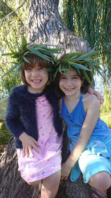Daliah Lee, eight,  (right) with her six-year-old sister Heidi. Photo: Supplied