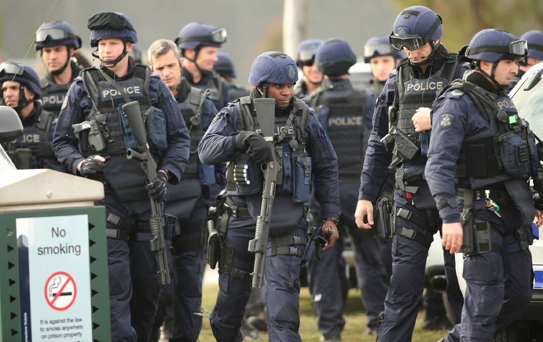 Victoria Police Special Operations Group members outside the Metropolitan Remand Centre, 20 kilometres west of Melbourne, on Tuesday. Photo: Pat Scala