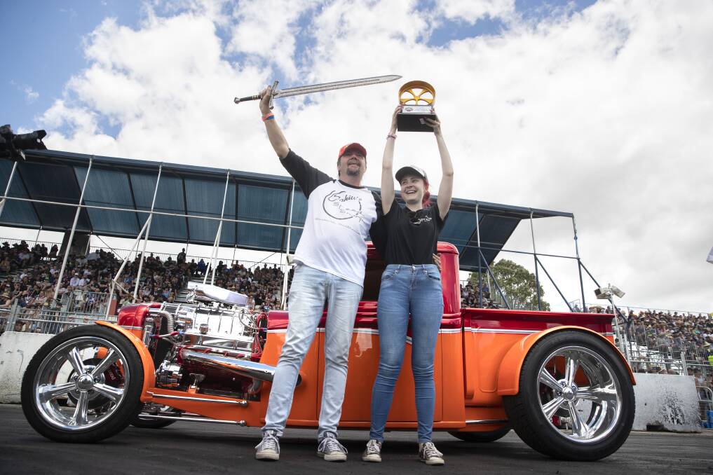 Rick Werner from the Gold Coast celebrates with his daughter Danielle after his 1932 Ford pickup hotrod was named the 2019 Summernats Grand Champion Photo: Sitthixay Ditthavong