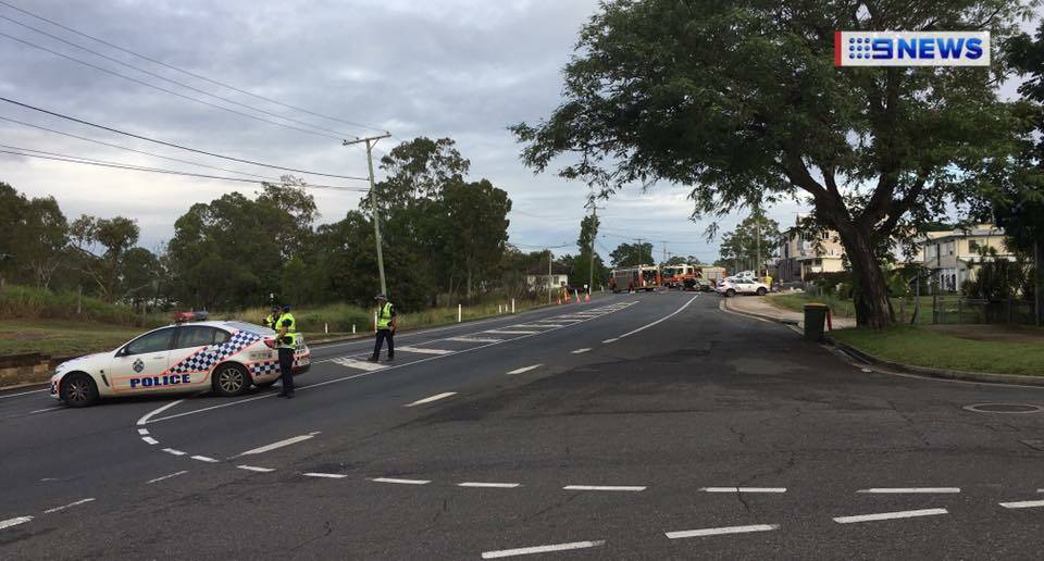 A Holden Commodore sedan and Ford Falcon ute collided on Lakes Creek Road at Koongal early Saturday, police say. Photo: 9 News Central Queensland