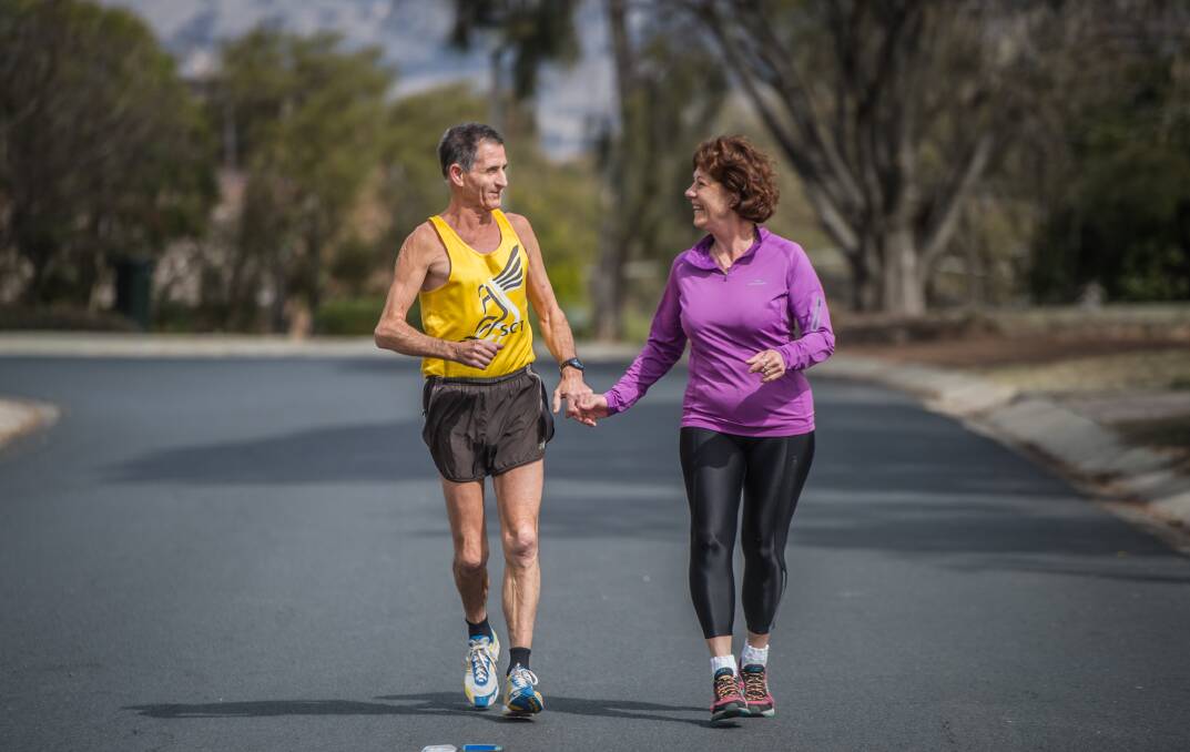 Jim and Maria White of Wanniassa, who this year will run their 41st and 35th Canberra Times Fun Run together. Photo: Karleen Minney
