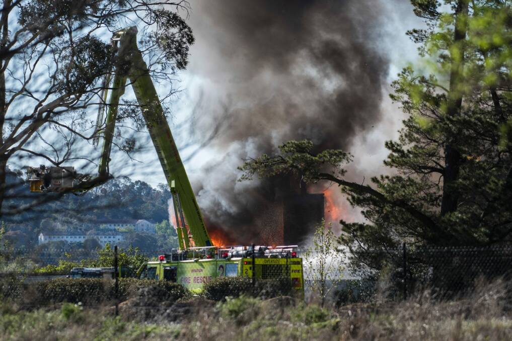 Emergency services battle a fire at Pialligo Estate. Photo: Rohan Thomson