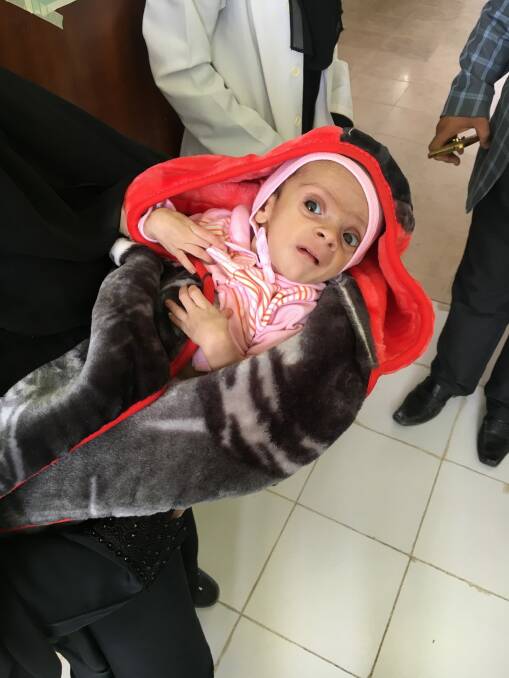 This is Abdulrhaman, a two month old baby in one of IMC's facilities, who this weekend weighed 3 kilograms. Severe malnutrition and dehydration from diarrhea. Photo: Simon Cowie