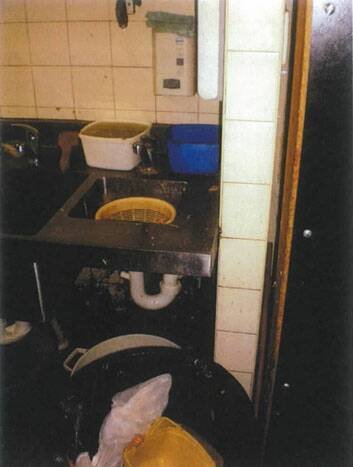 Designated hand wash basin showing it is inaccessible and unclean and used for more than solely washing hands. Photo: Supplied