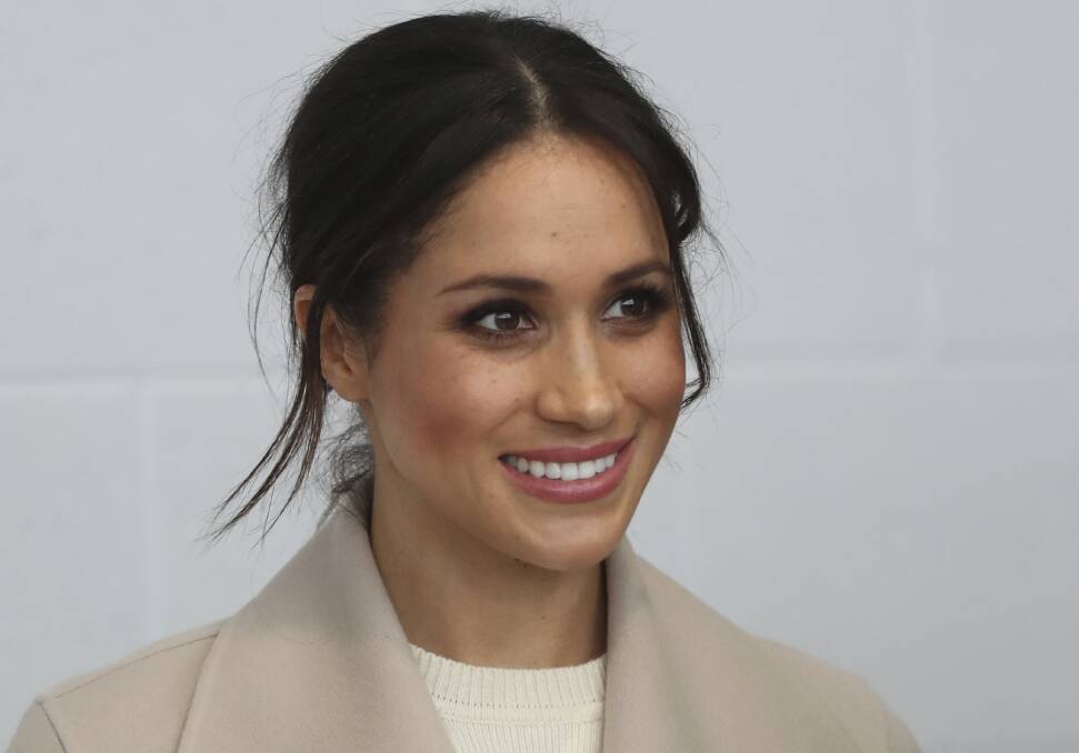 Meghan Markle  smiles during a visit with Prince Harry to the  Eikon Exhibition Centre in Lisburn, Northern Ireland. Photo: AP