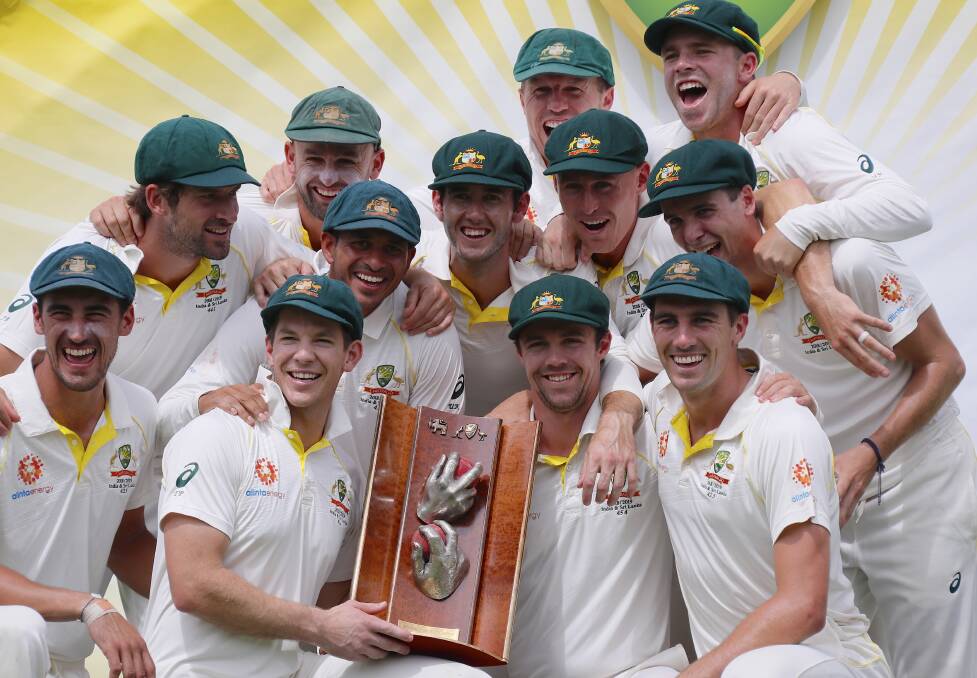 Winning feeling: Tim Paine's Australian team celebrate a 2-0 series victory against Sri Lanka. Photo: AAP