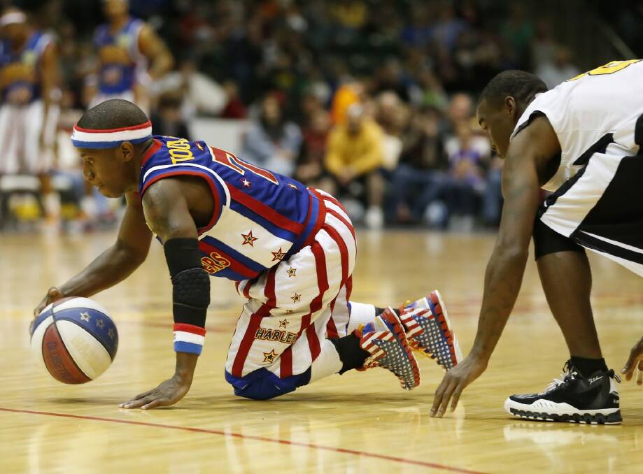 Little marvel: Too Tall Hall is the smallest player in Harlem Globetrotters history. Photo: Supplied