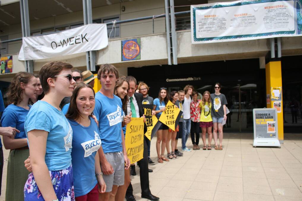Greens MLA Shane Rattenbury and ANU students protest outside the university's Commonwealth Bank branch. Photo: Emma Kelly