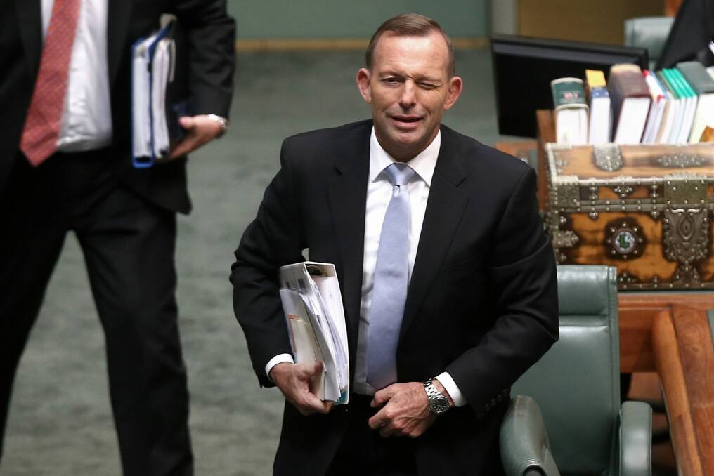 A wink from former prime minister Tony Abbott. Photo: Alex Ellinghausen