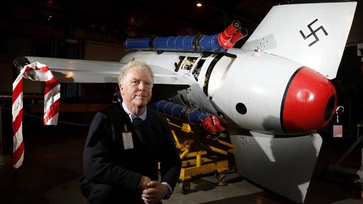 Australian War Memorial senior curator John White next to a German Enzian anti-aircraft missile from the collection. Photo: Jeffrey Chan
