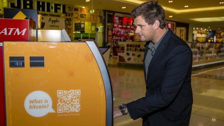 Australian Bitcoin ATMs director Robert Masters uses Canberra's first Two-Way Bitcoin ATM at the Canberra Centre. Photo: Jamila Toderas