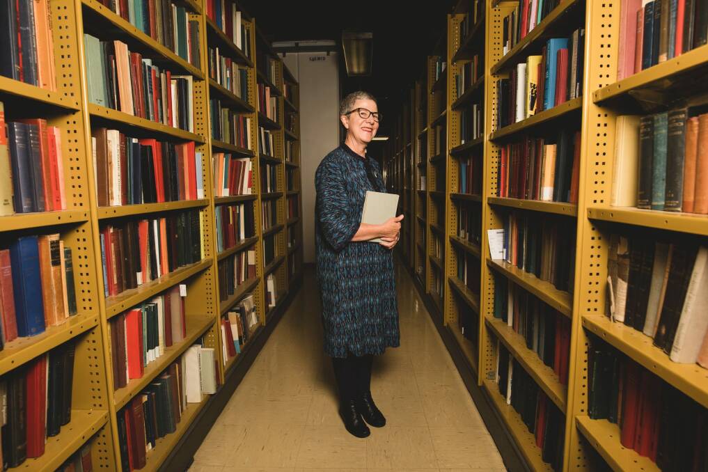 Dr Marie-Louise Ayres in the underground area of the National Library known as the Stacks where books are housed.  Photo: Jamila Toderas