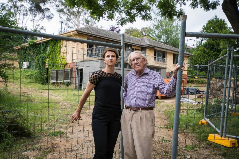 Resident Luisa Capezio and historian Alan Foskett say planning codes for Campbell allow single homes like this one to be knocked down and replaced with up to four dwellings. Photo: Dion Georgopoulos