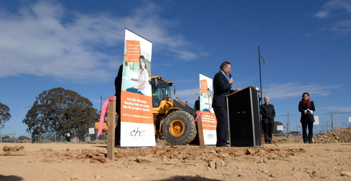 Flashback to August, 2009: Jon Stanhope turns the first sod on a block in Forde as part of the launch of stage two of the affordable housing action plan. Photo: Graham Tidy GGT