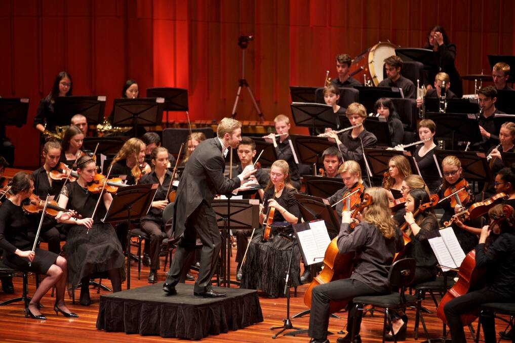 Leonard Weiss, centre, conducts the Canberra Youth Orchestra. Photo: William Hall. Photo: William Hall