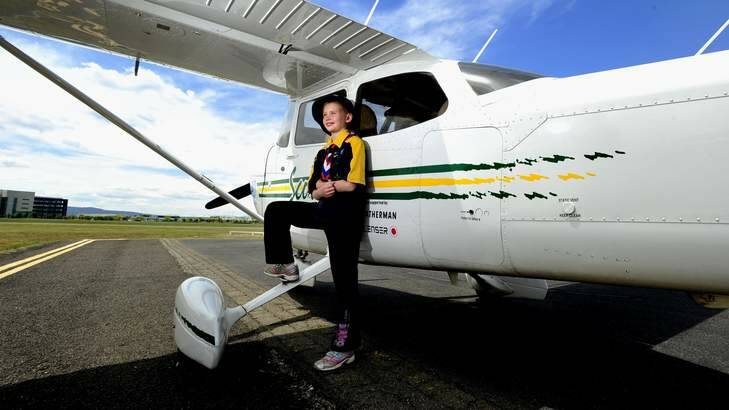 Alexandra Turvey, 8, of Ainslie, takes  part in the Scouts Australia NSW air activity centre flying days at Canberra Airport. Photo: Melissa Adams