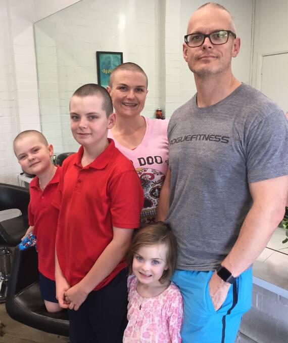 The family that shaves together, stays together, generous-hearted Annabelle Wright (left) aged eight who shaved her hair for the Leukaemia Foundation’s World’s Greatest Shave on March 14. She also persuaded mum Cristy, dad David and brother Oliver to do the same. They are pictured with Annabelle's little sister Alice, four. Photo: Supplied