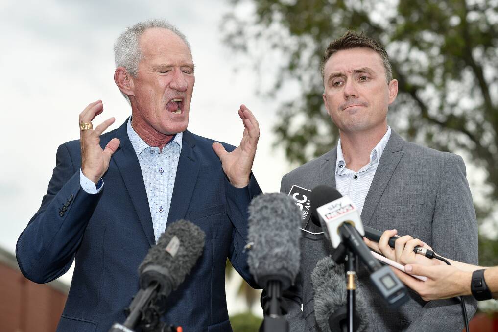 One Nation officials Steve Dickson and James Ashby answer questions at a press conference in Brisbane about lobbying efforts with America's NRA. Photo: AAP