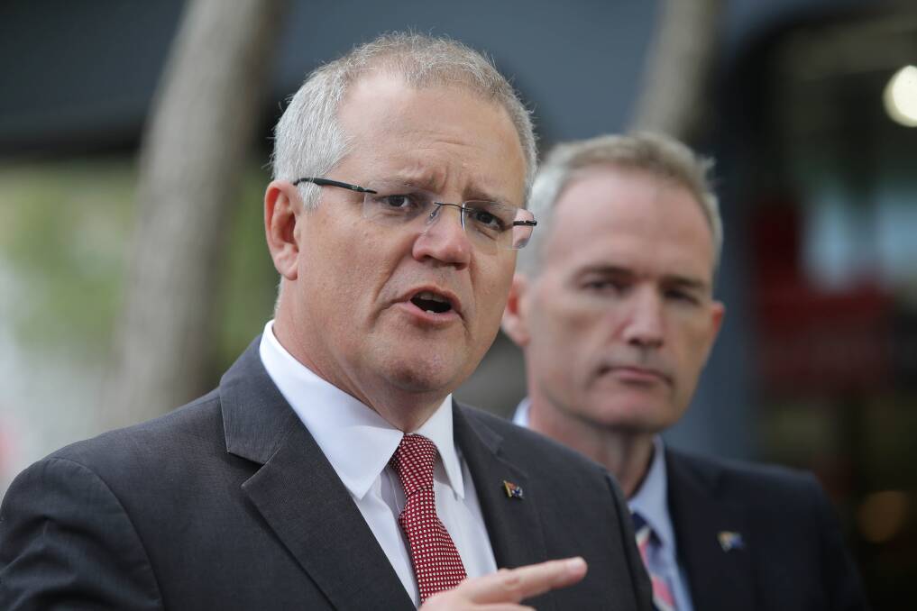 Prime Minister Scott Morrison and Immigration Minister David Coleman are connected to a bidder for a major government contract. Photo: Fairfax Media