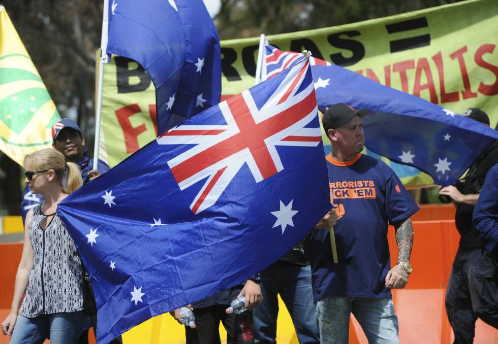 Reclaim Australia national rally on Parliament House Lawns was the first in a series of globally coordinated Anti-Islam protests Photo: Graham Tidy