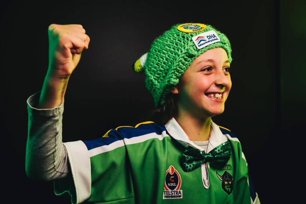 Poppi Laine, 9, who has only missed one home game this season, at the Raiders Club Belconnen to cheer on the team. Photo: Rohan Thomson