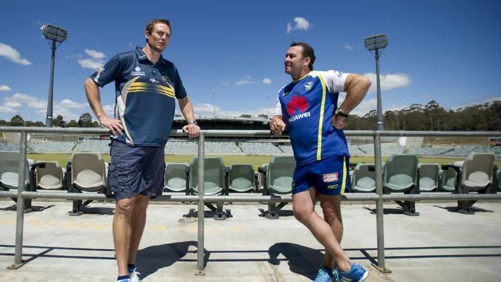 Brumbies coach Stephen Larkham and Canberra Raiders coach Ricky Stuart ready for the 2014 season. Photo: Jay Cronan