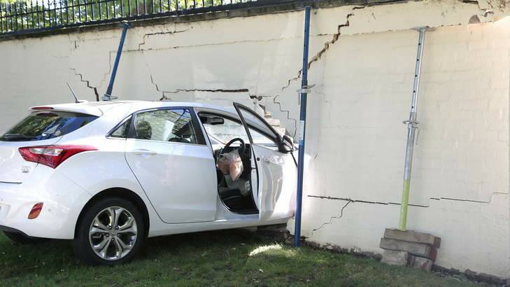 A crashed car lodged in the wall of the Lodge in Canberra. Picture: Supplied