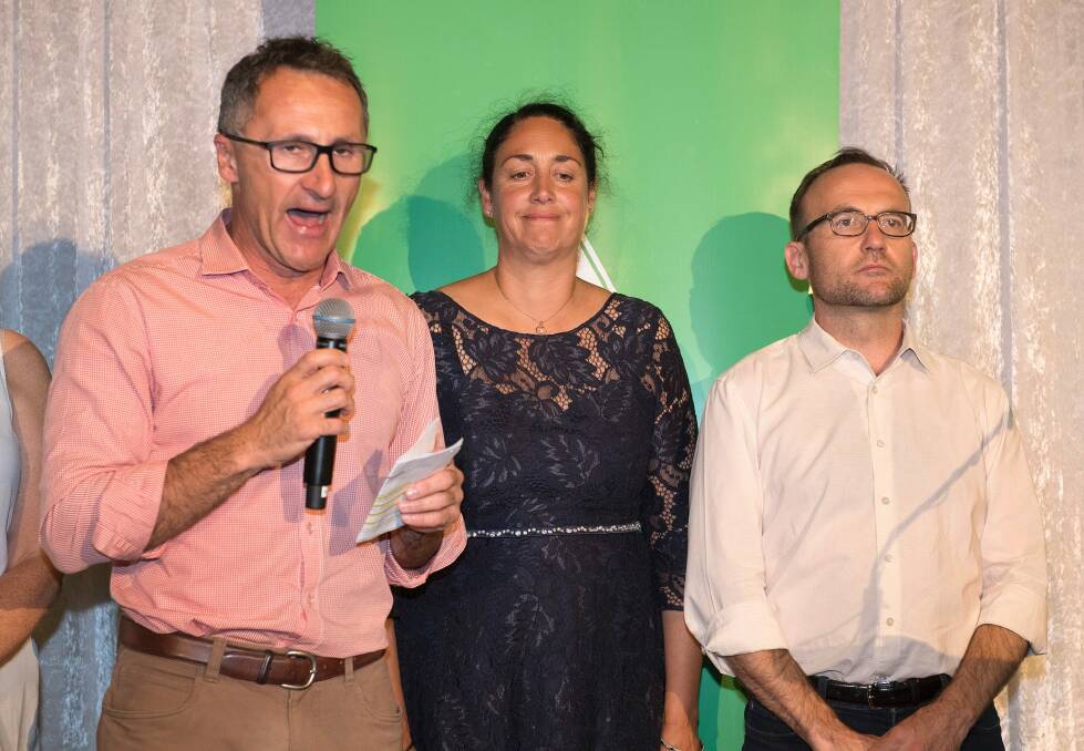 Alex Bhathal on the night of her defeat at last year's Batman byelection, with party leader Richard Di Natale and Melbourne MP Adam Bandt.  Photo: AAP