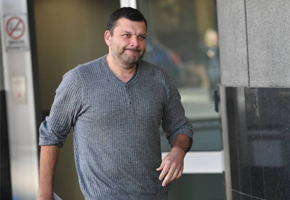 Seb Monsour leaves the police watchhouse  in June. Photo: AAP/Dan Peled