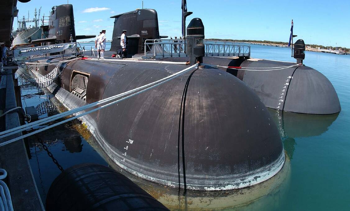 After several years of absence HMAS Collins returns to Fleet Base West. It is the first time ever that all the Collins Class submarines have been alongside Fleet Base West.  Photo: Department of Defence