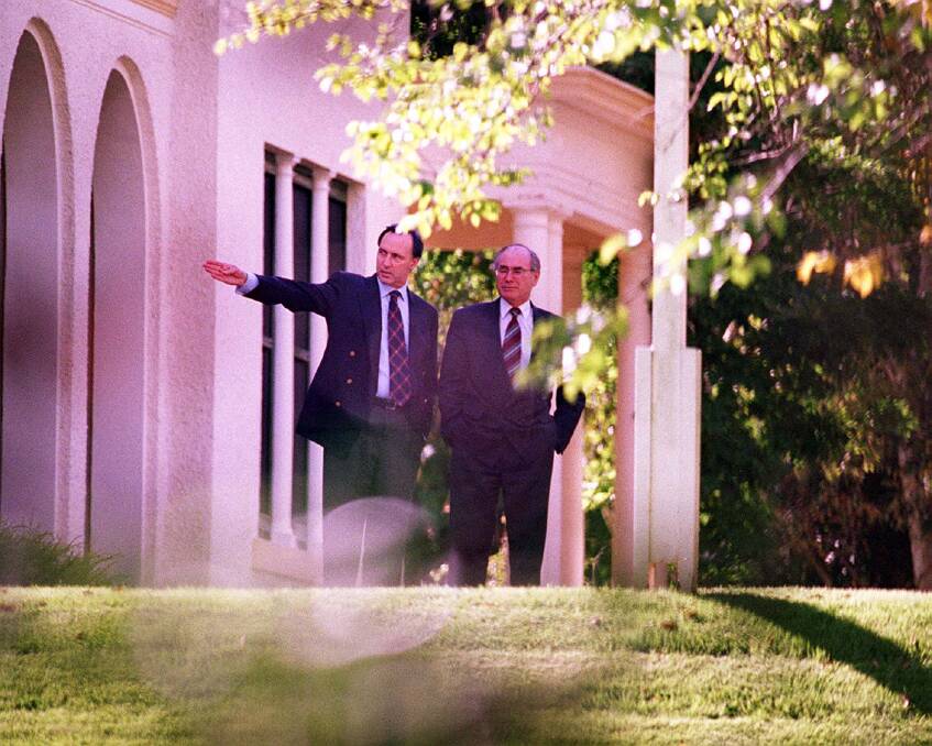 Paul Keating shows the prime minister-elect John Howard around The Lodge in Canberra, 1996. Photo: Mike Bowers