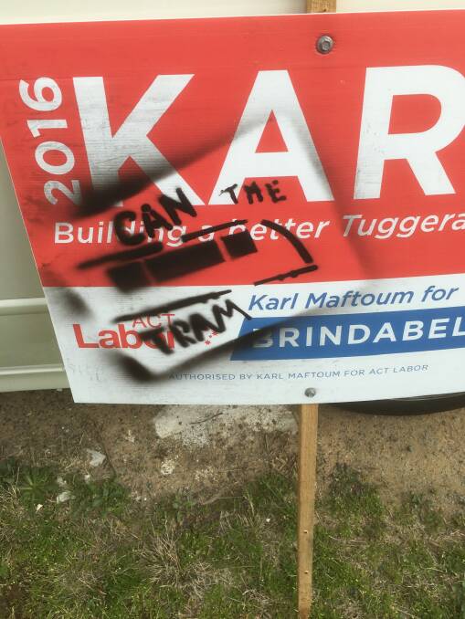 A sign for Labor candidate Karl Maftoum, which was defaced near Drakeford Drive. Photo: supplied