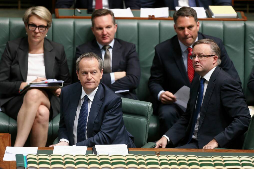Opposition Leader Bill Shorten and shadow immigration minister Richard Marles (back right) have indicated a turn-backs turnaround for Labor, but deputy Opposition Leader Tanya Plibersek (back left) is reportedly against the idea.  Photo: Alex Ellinghausen