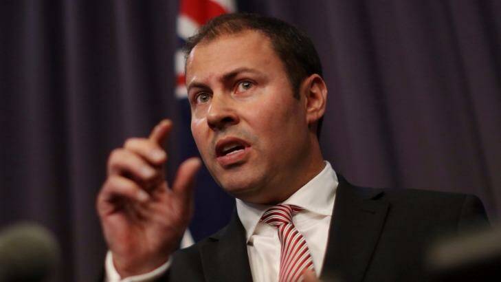 Josh Frydenberg, parliamentary secretary to the Prime Minister, said cutting red tape would make for a "more efficent administration". Photo: Andrew Meares