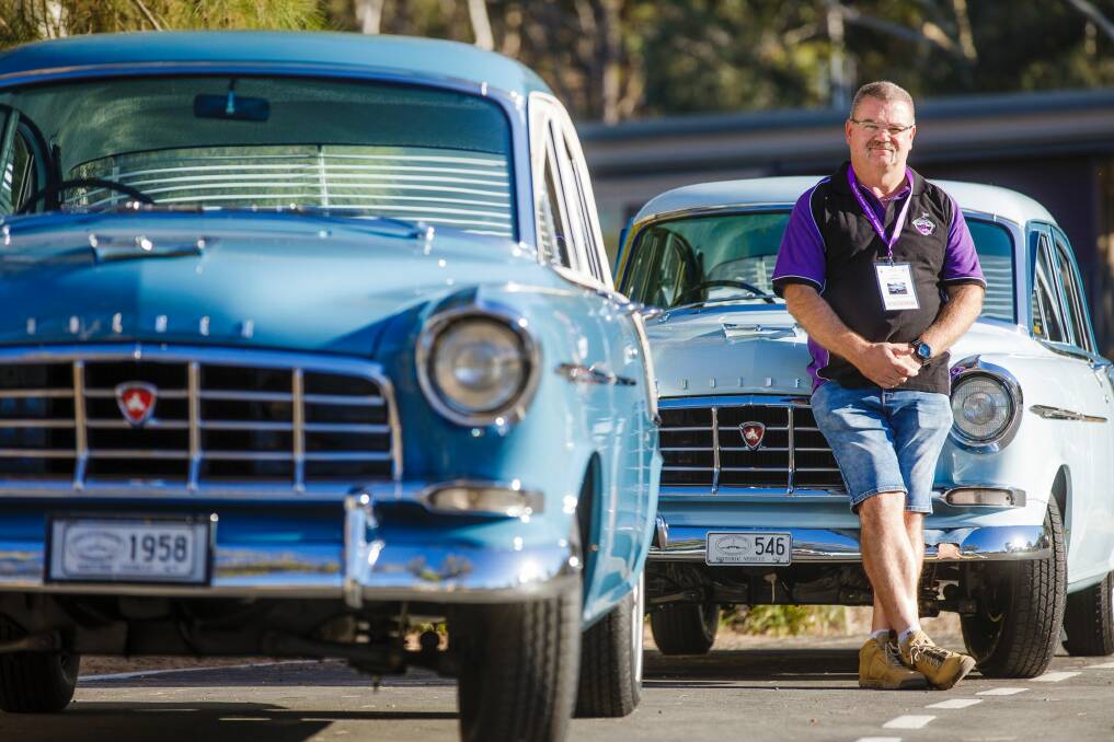 Mr Pryce with his 1959 FC Holden (back) and a 1958 FC Holden (front) belonging to David and Jodie Potter. Photo: Sitthixay Ditthavong