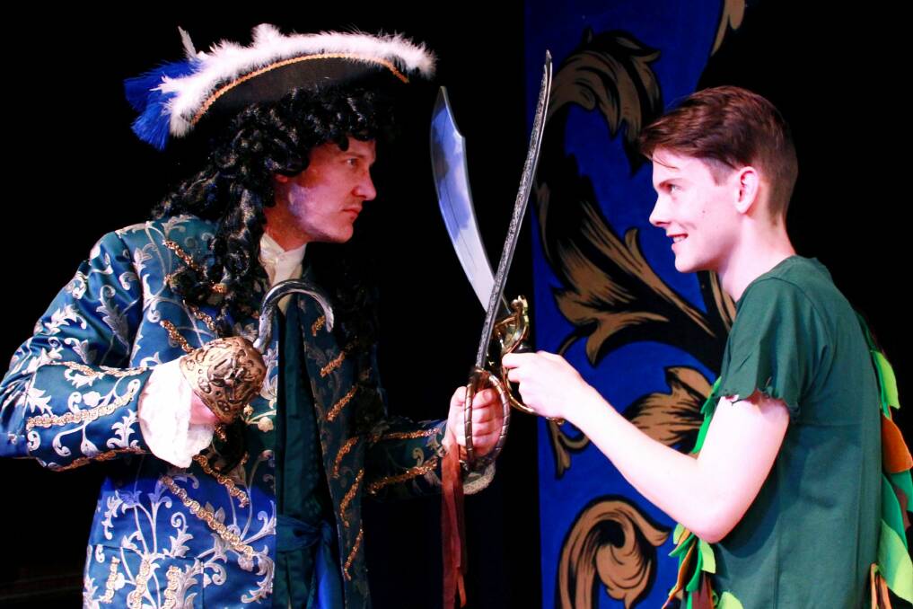 Greg Sollis, left, as Hook and Josh Kirk as Peter Pan clash in Ickle Pickle's  <i>Peter Pan the Musical</i>. Photo: Jenny Watson