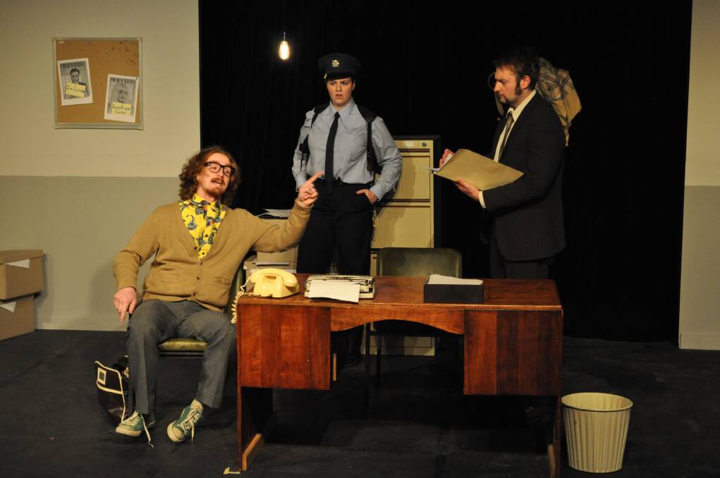 Hayden Splitt as Maniac, left, Anneka van der Velde as Constable and Nick Steain as Inspector Bertozzo in <i>Accidental Death of an Anarchist</i>.  Photo: Jamie-Leigh Temby