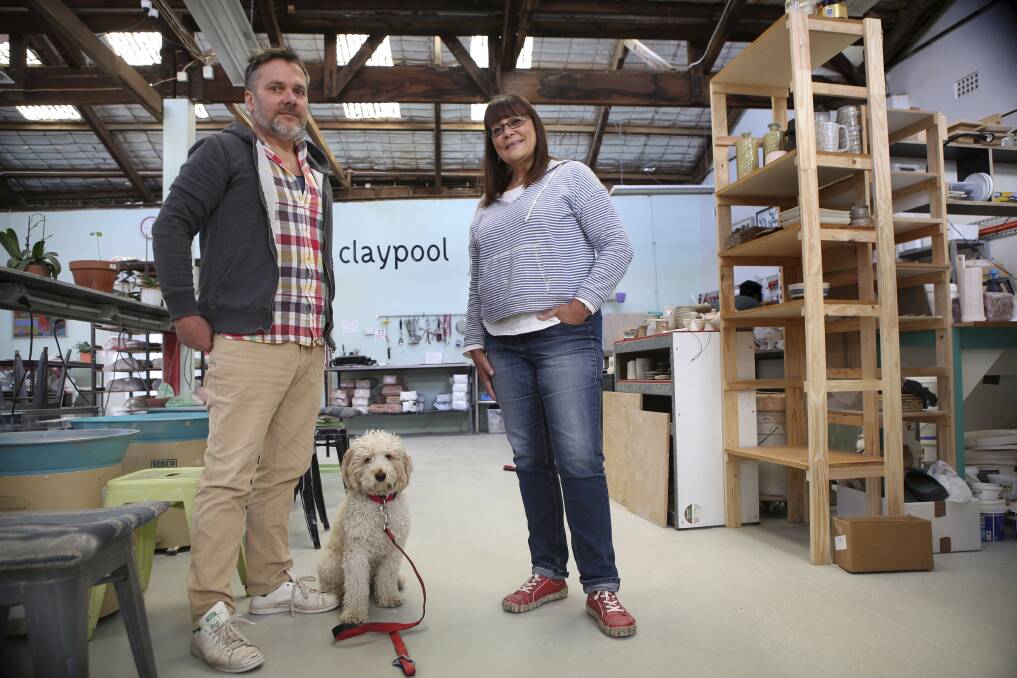 Brett Stone and Cherie Peyton, and dog Benton, at his studio.  Photo: James Alcock