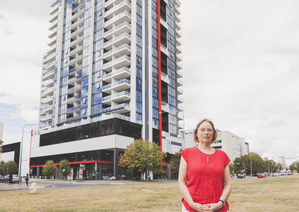 Crossbencher Caroline Le Couteur (pictured) stands outside the Sentinel building in Belconnen where west-facing residents say living is "sub-standard". Photo: Jamila Toderas