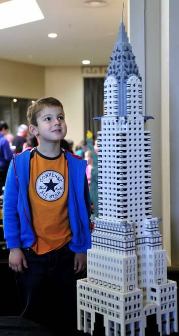 Brad Newman,6 of Queanbeyan takes a closer look at a Lego version of New York's Chrysler Building at Canberra Brick Expo in the Hellenic Club at Woden. Photo: Melissa Adams