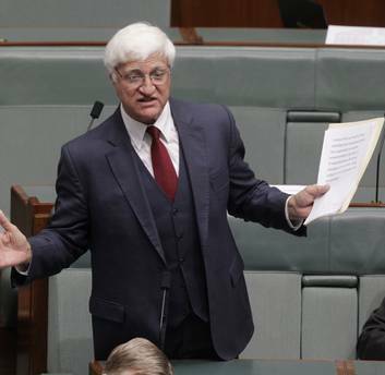 Bob Katter seeks to move to suspend the standing orders during question time as Rob Oakeshott reacts. Photo: Andrew Meares