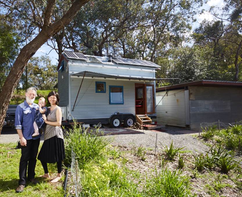 Fred Schultz, wife Shannon and daughter Olina with the tiny home Mr Schultz built. Photo: Supplied