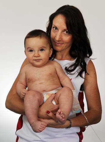 Alison Senti is raising money for children such as eight-month-old Massimo Solari, who recently had heart surgery, by running in the New York Marathon. Photo: Colleen Petch