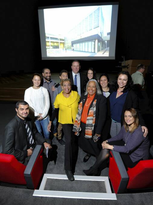 Reg Saunders' daughters, Dorothy Burton, (centre left with yellow coat)  and Glenda Humes (with scarf), along with extended family at the opening of the Captain Reginald Saunders Theatre on Wednesday. Photo: Graham Tidy