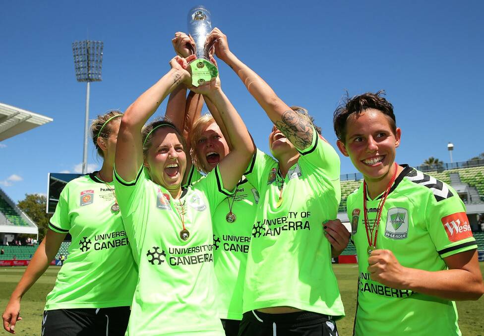 Canberra United players celebrate their W-League grand final victory against Perth Glory in December last year. Photo: Paul Kane