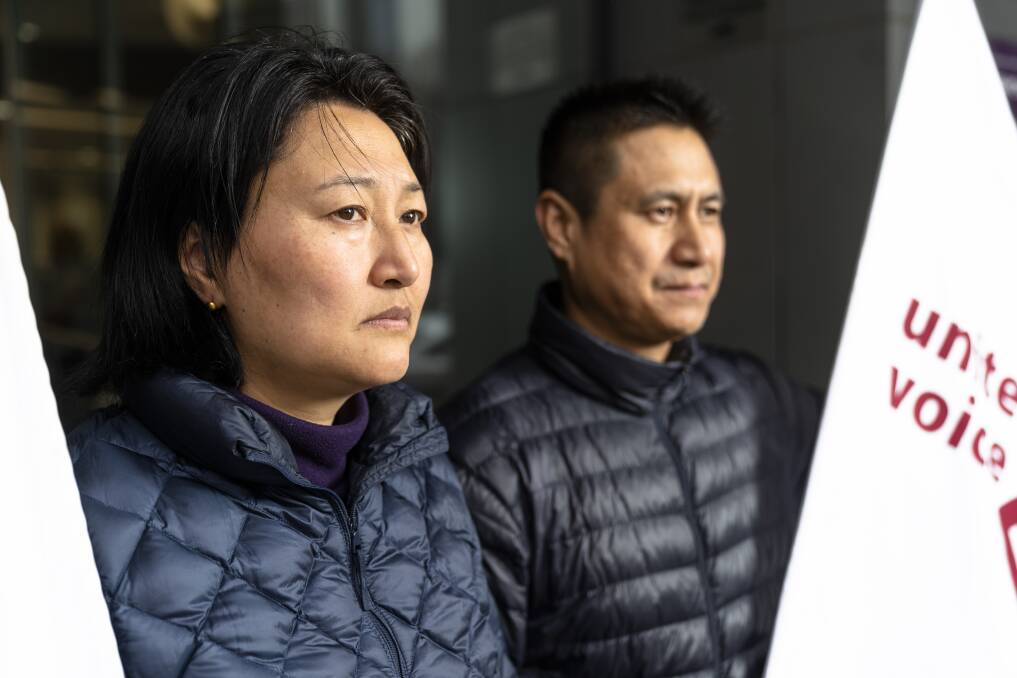 Kinley Zam (left) and Namgay Namgay were among nine Canberra cleaners who lost their jobs due to staff cuts after cleaning services at government buildings went to a new contractor, Broadspectrum and subcontractor Prompcorp. Photo: Lawrence Atkin