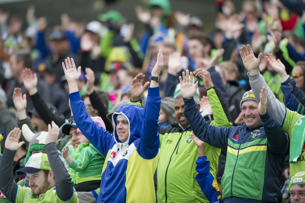 Raiders fans do the Viking clap during last Sunday's match against the Eels. Photo: Jay Cronan