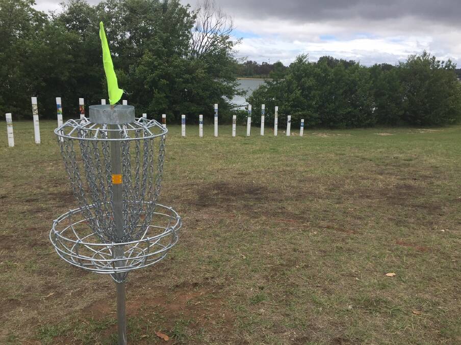 This disc golf basket in the middle of the SIEV X Memorial is set to be removed. Photo: Megan Doherty