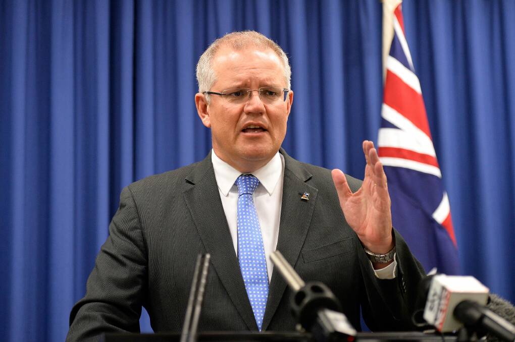 Scott Morrison is struggling to find a palatable solution to the structural deficit. Photo: Bradley Kanaris